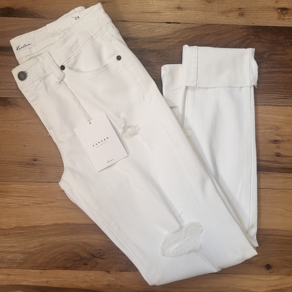 KanCan white distressed, cuffed at ankle jeans.
